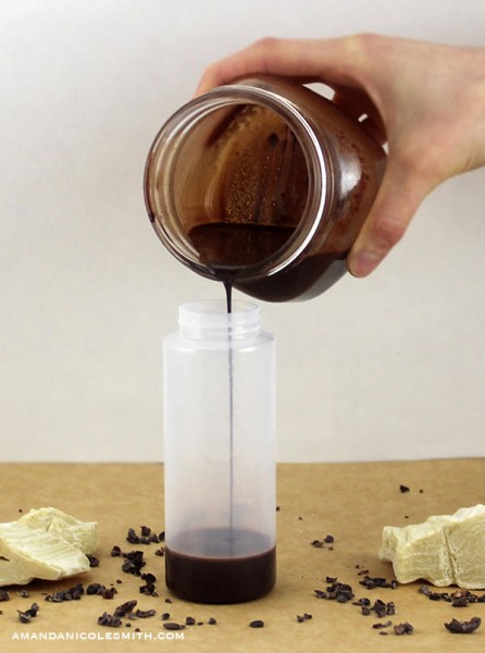 Pouring raw vegan chocolate sauce